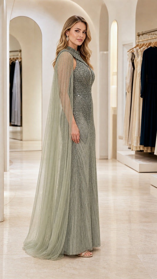 Side angle of Sage Green beaded formal gown with sweeping cape