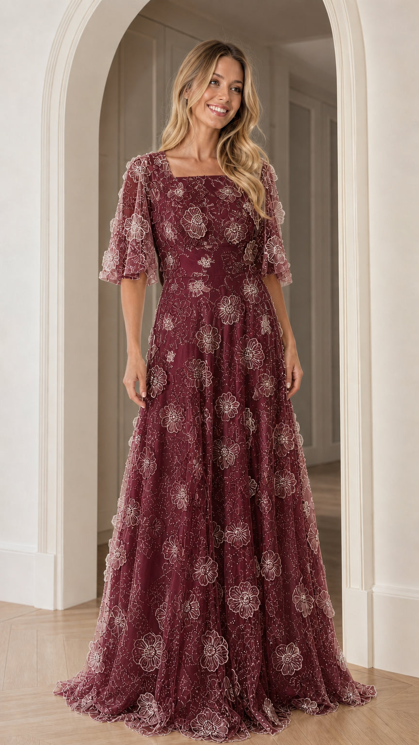 Front view of burgundy floral applique maxi dress