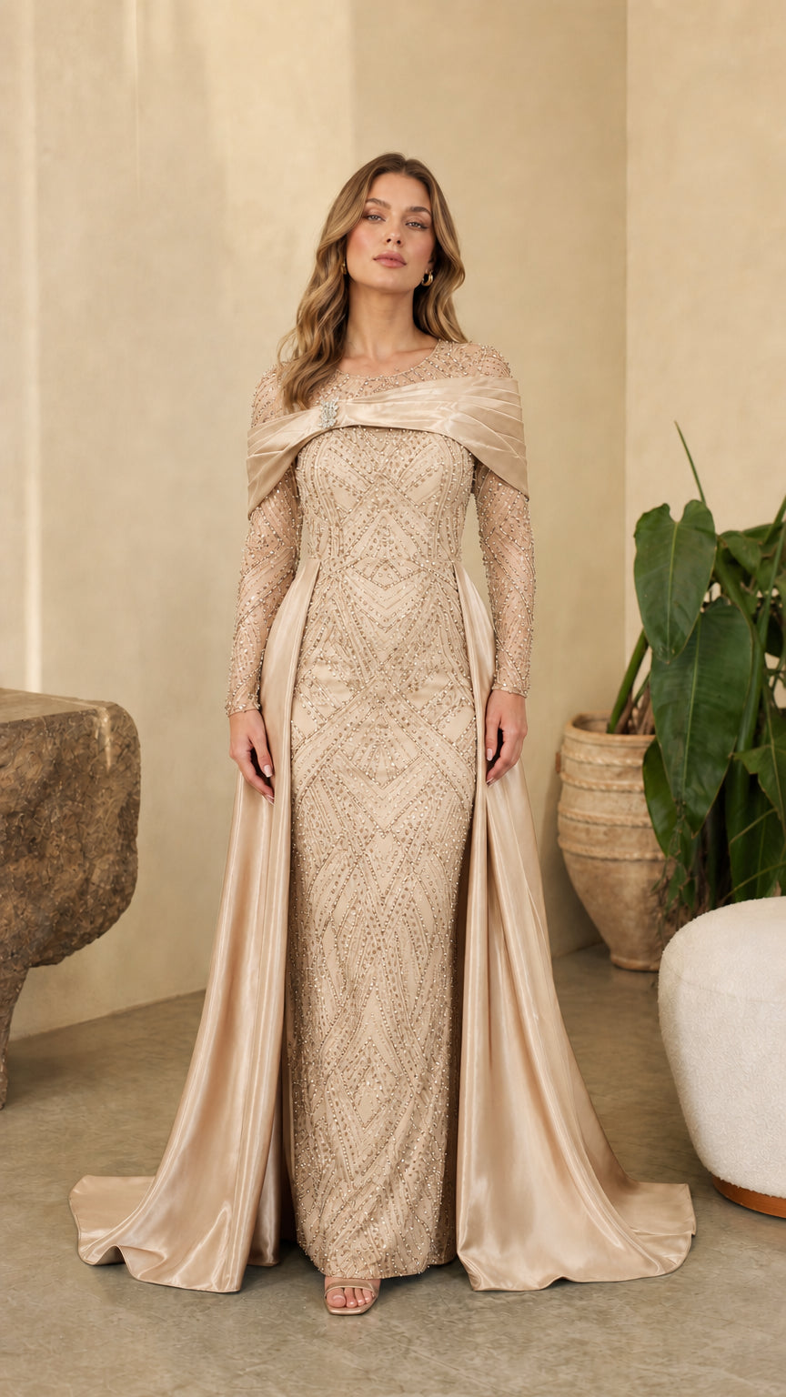 Full front view of model wearing Champagne gold sequin evening dress with matching satin overskirt