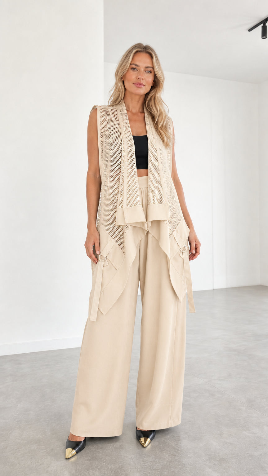 Model wearing beige two-piece set