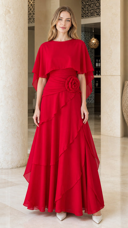 Front view of woman wearing red chiffon cape formal evening dress