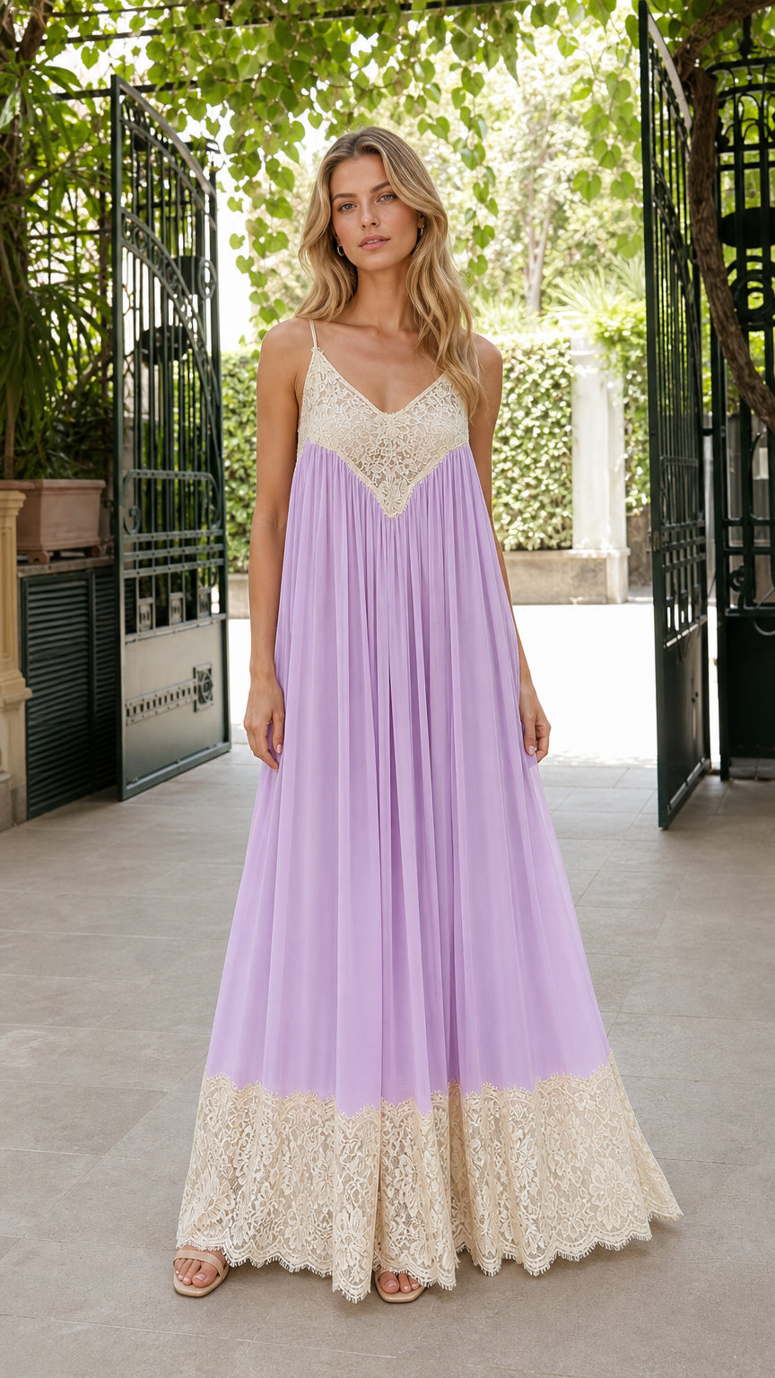 Front full view of woman wearing lavender flowy cami maxi dress with beige crochet lace bodice and hem