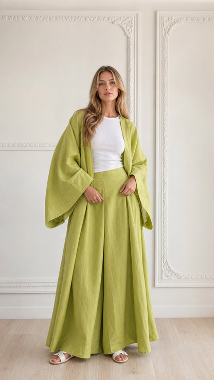 Front view of woman wearing lime green kimono cardigan and matching wide leg pants set