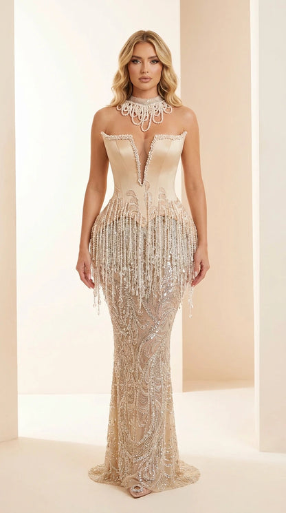 Front view of Champagne beaded fringe mermaid evening gown