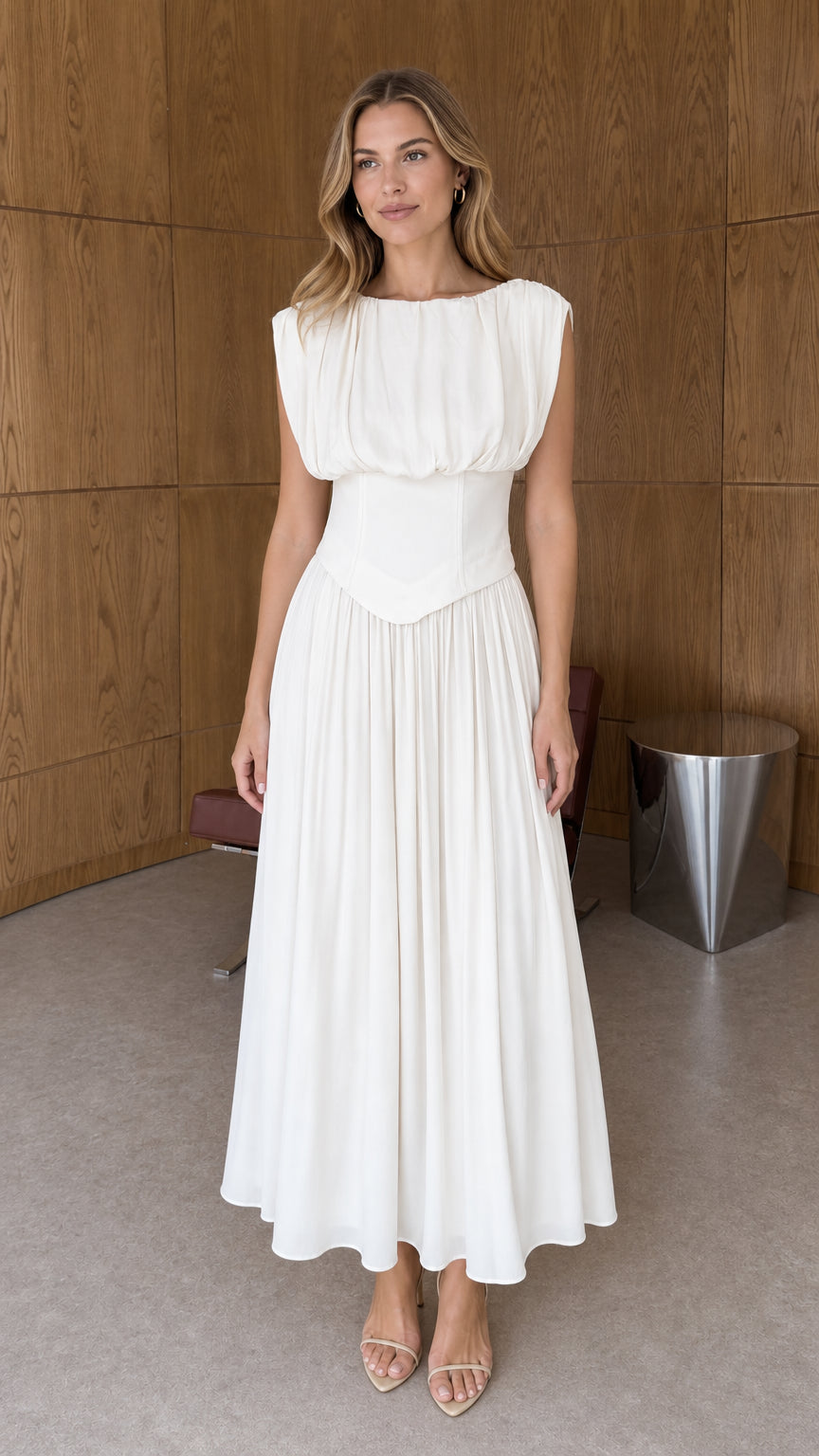Front full-length view of woman wearing white sleeveless pleated basque waist midi dress
