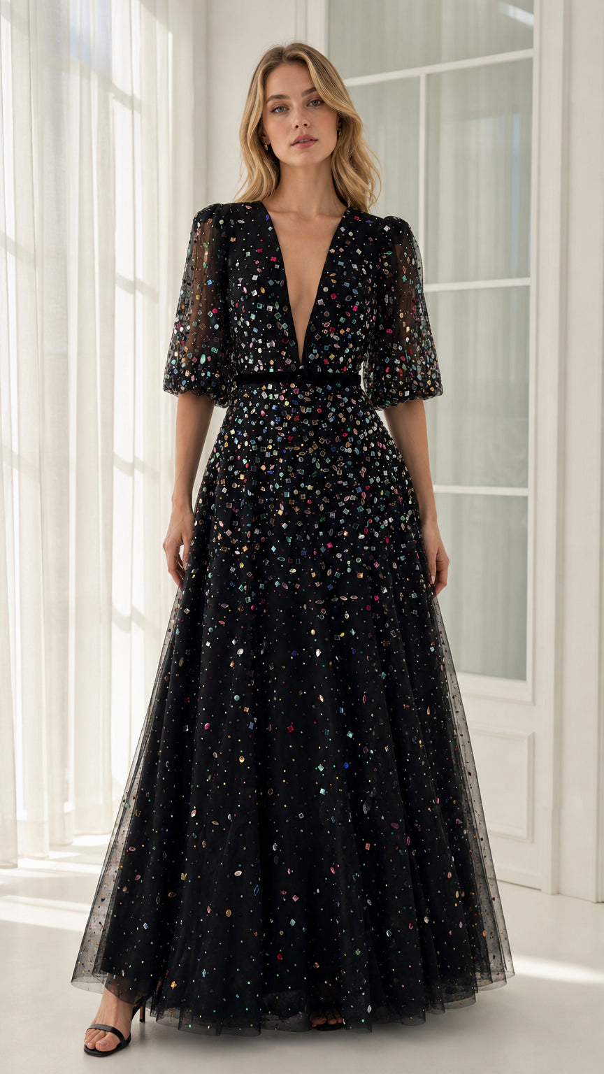 Front view of black crystal-embellished V-neck tulle evening gown