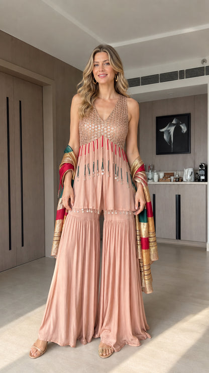 Blush pink sleeveless sharara suit set with sequin bodice and pleated flared pants