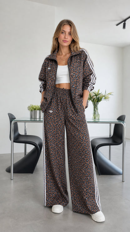 Front view of model wearing brown leopard print track set with wide-leg pants
