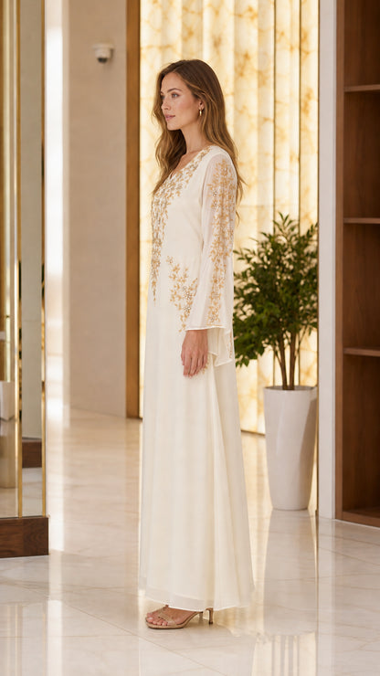 Side profile of Ivory kaftan maxi dress with gold floral embroidery