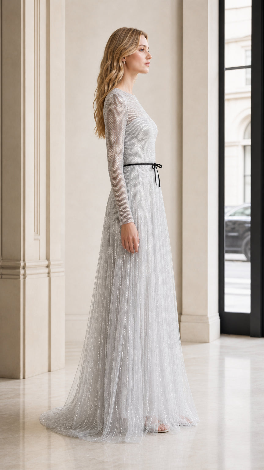 Side profile view of silver sequin evening gown