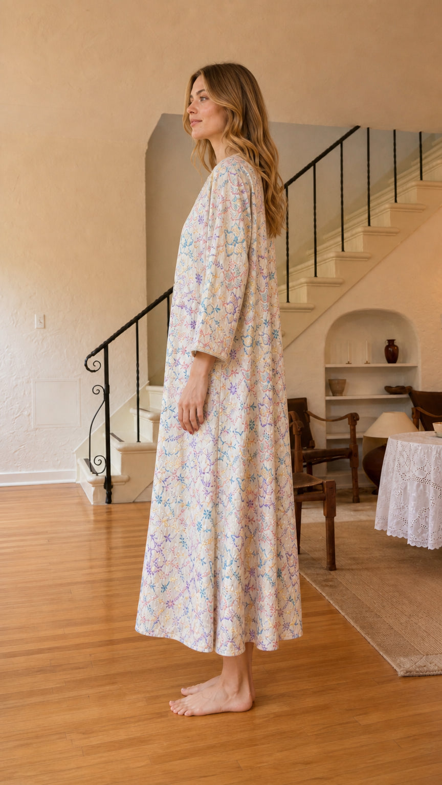 Side view of ivory floral embroidered kaftan dress