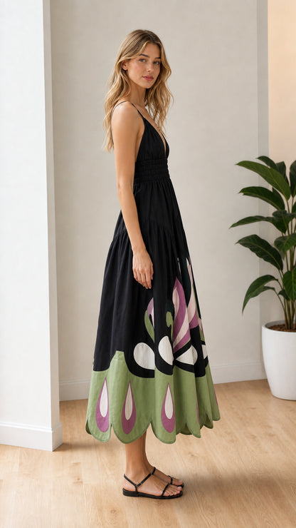 Side profile view of black maxi dress on model