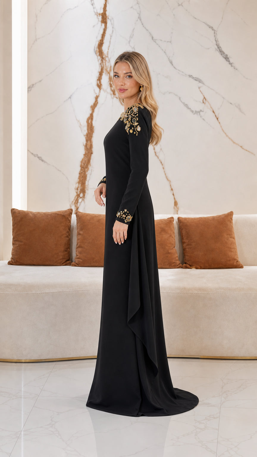 Side profile of black formal gown showing cascading side drape