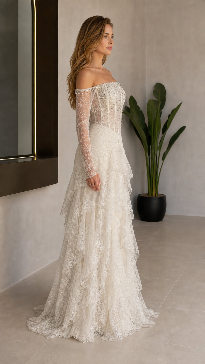 Side profile view of Ivory lace gown