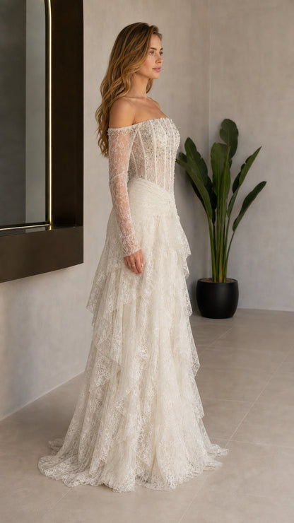 Side profile view of Ivory lace gown