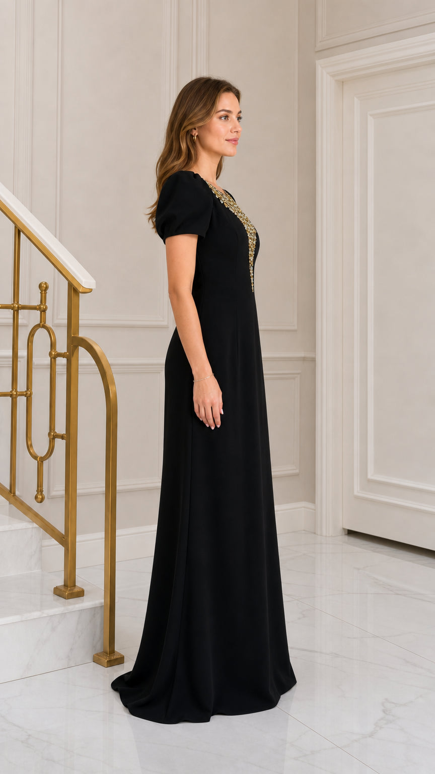 Side profile view of black rhinestone-embellished puff sleeve formal maxi gown