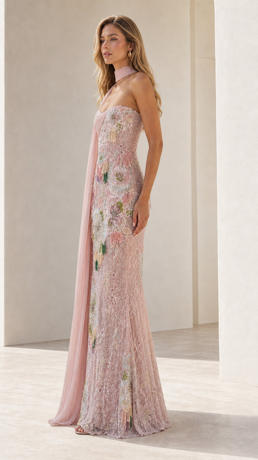 Side profile view of pink evening gown