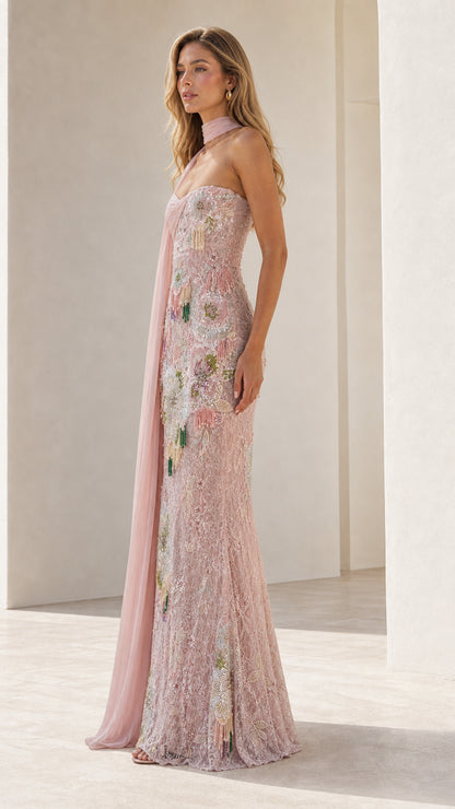 Side profile view of pink evening gown