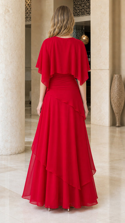 Back view of red evening dress showing flowing tiered skirt
