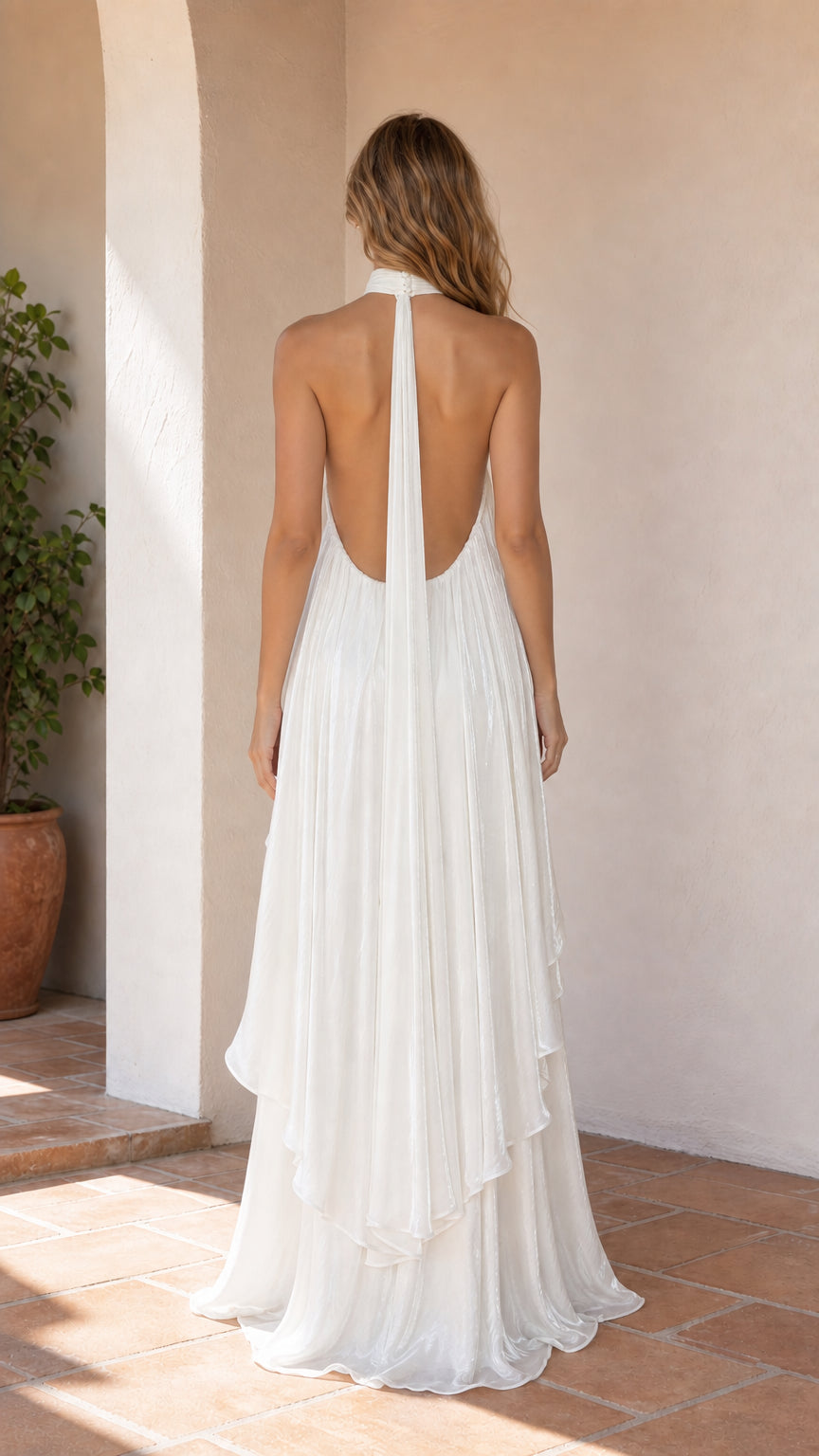 Back view showcasing open back design of white maxi dress
