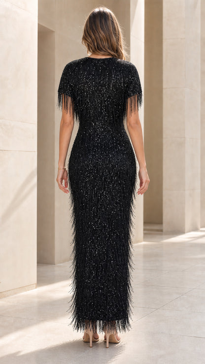 Back view of black sequin fringe maxi gown