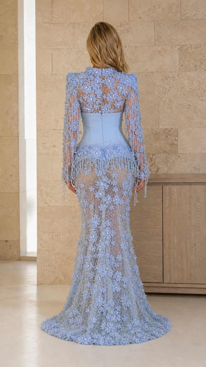 Back view of light blue sheer back gown