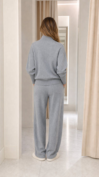 Back view of woman wearing relaxed soft grey knit lounge set