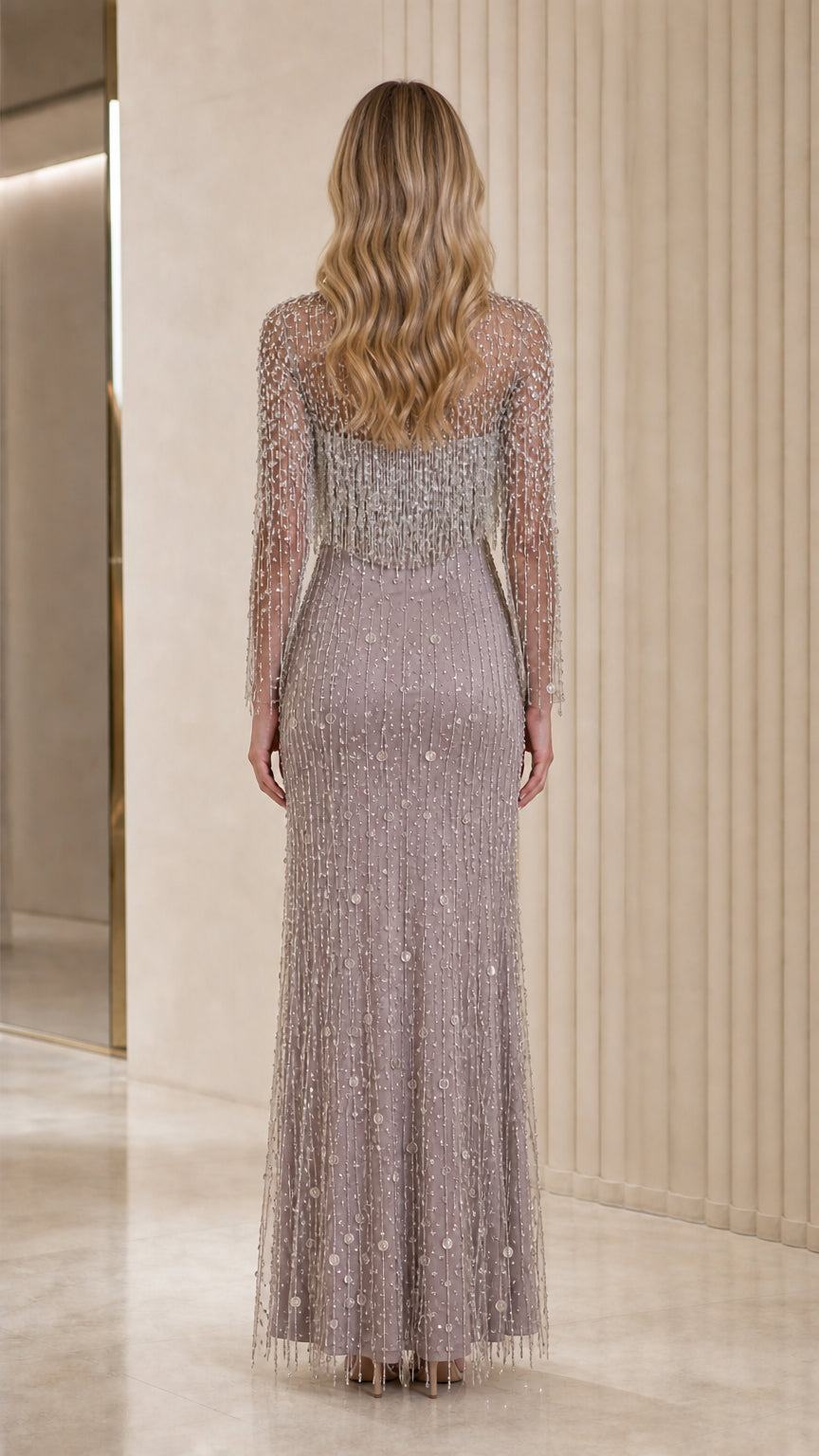 Back view of model in elegant mauve floor-length formal dress