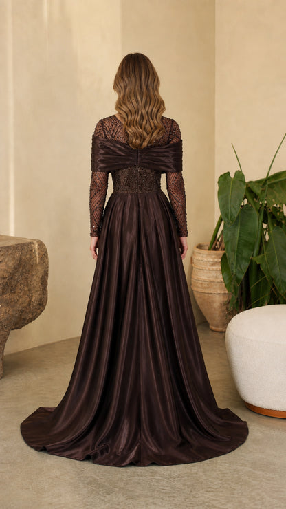 Back view of model wearing Chocolate Brown sequin gown showing the full satin train and back drape