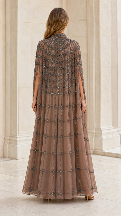 Back view of taupe sheer cape evening dress