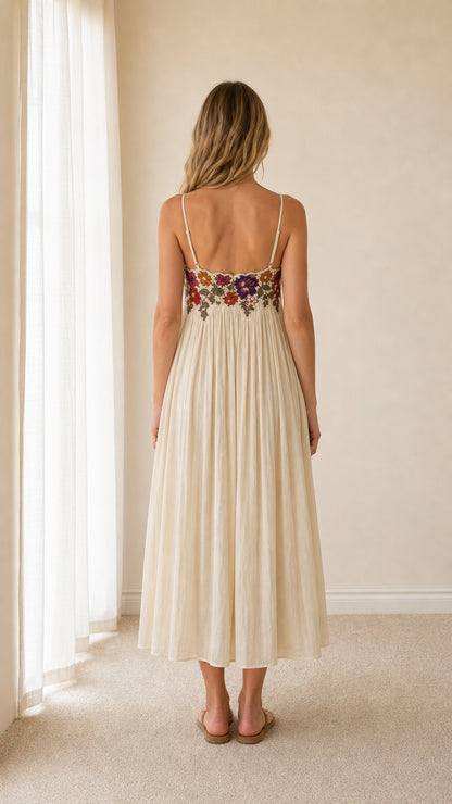 Back view of cream floral embroidered midi dress