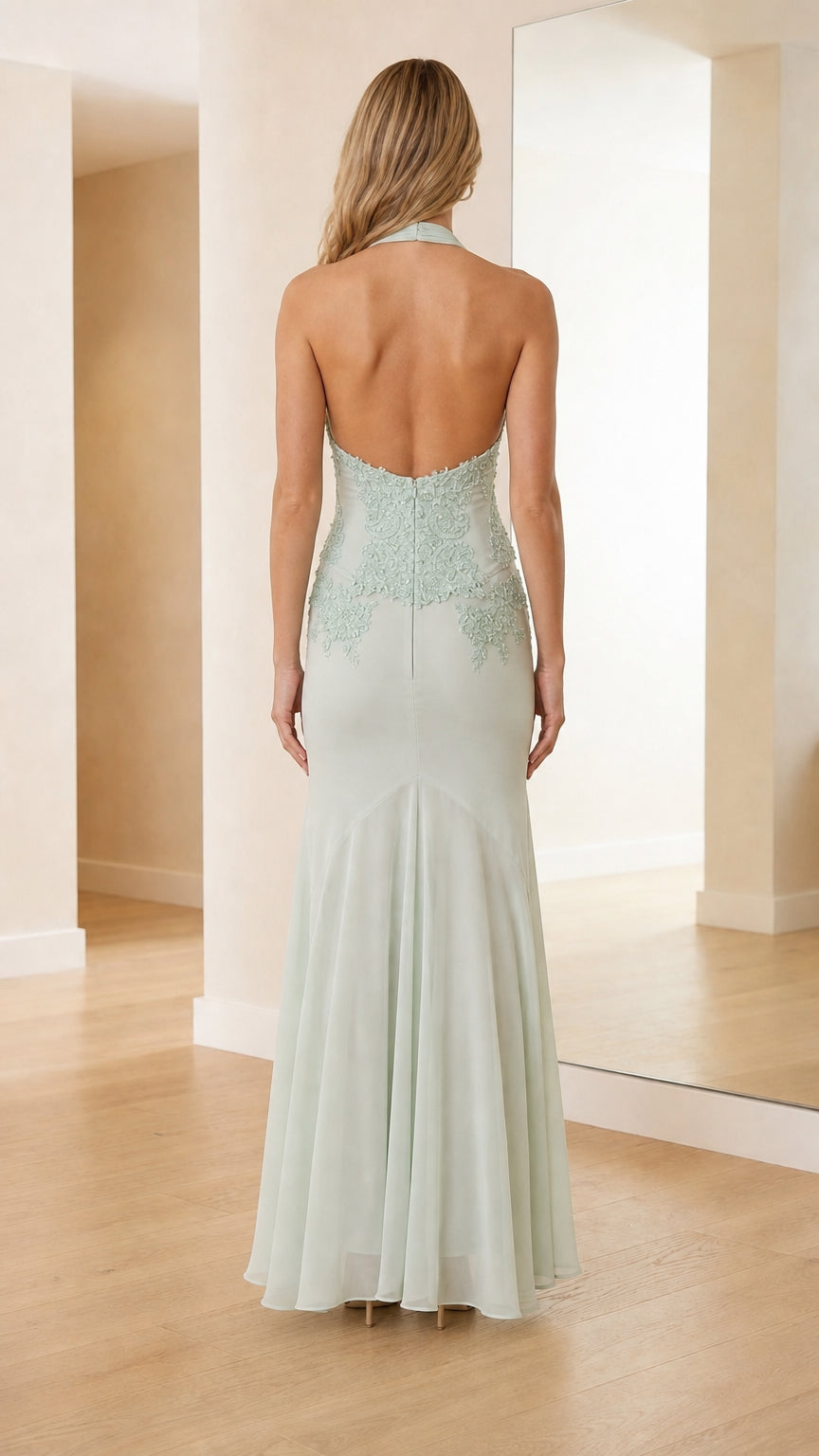 Back view showcasing open back design of sage green dress