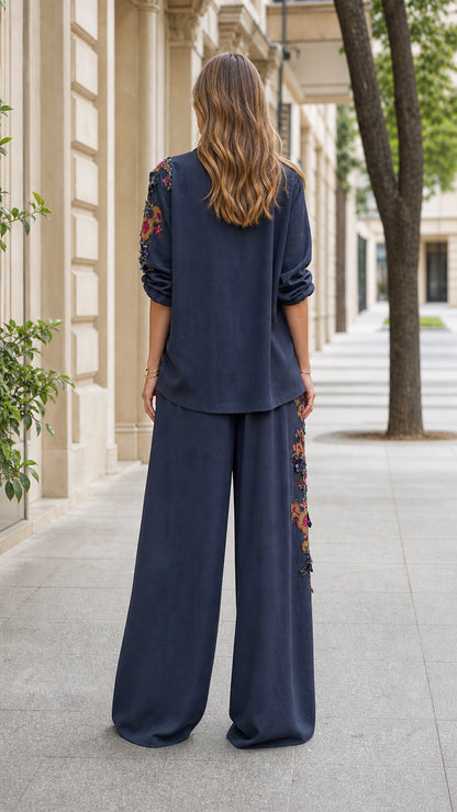 Back view of navy embroidered blazer and pants set