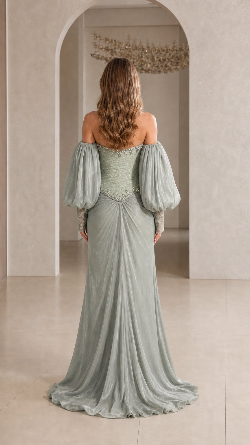 Back view of model in Sage Green off-the-shoulder evening maxi dress with sweep train