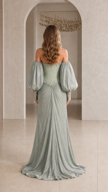 Back view of model in Sage Green off-the-shoulder evening maxi dress with sweep train