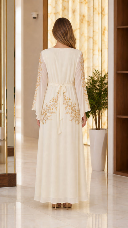 Back view of Ivory kaftan dress showing waist tie detail