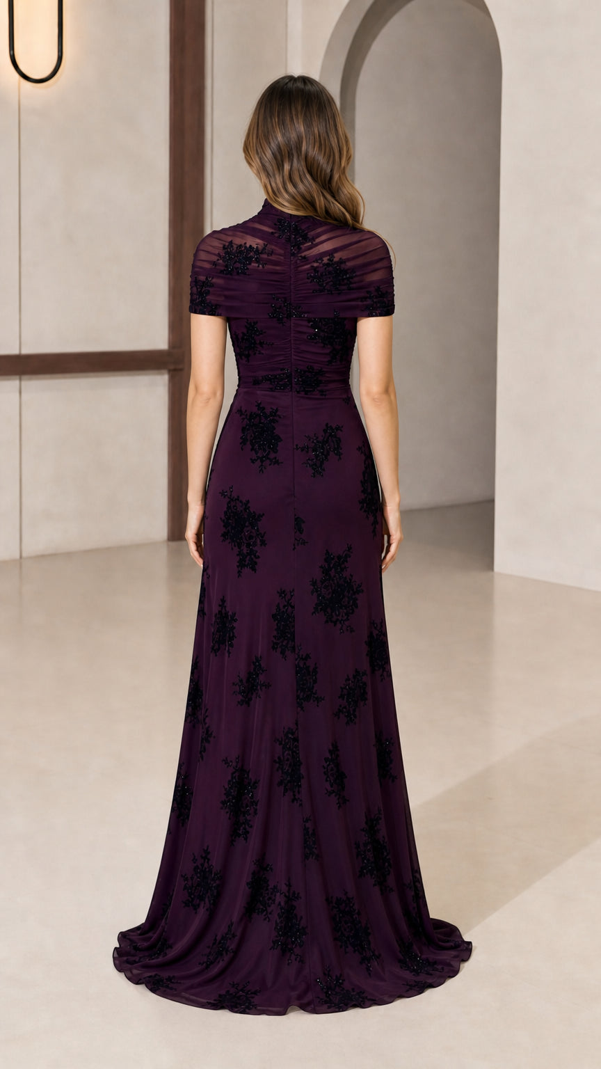 Model wearing plum evening gown back view
