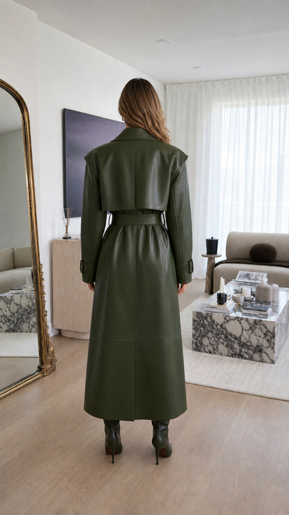 Back view of woman in olive green faux leather trench coat