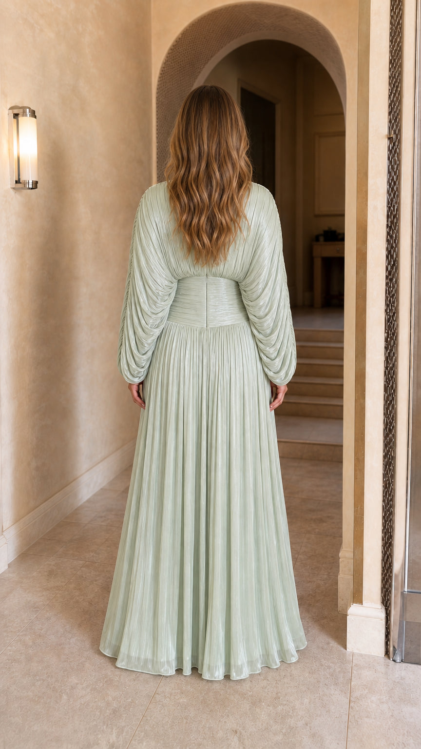 Back view of the sage green pleated maxi dress