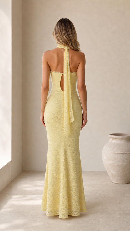 Back view of model showing keyhole back and choker tie in yellow lace