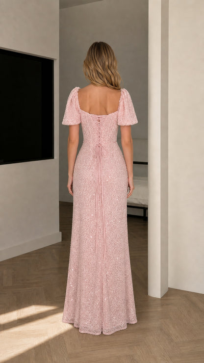 Back view of Blush Pink sequin maxi dress showcasing adjustable lace-up corset back