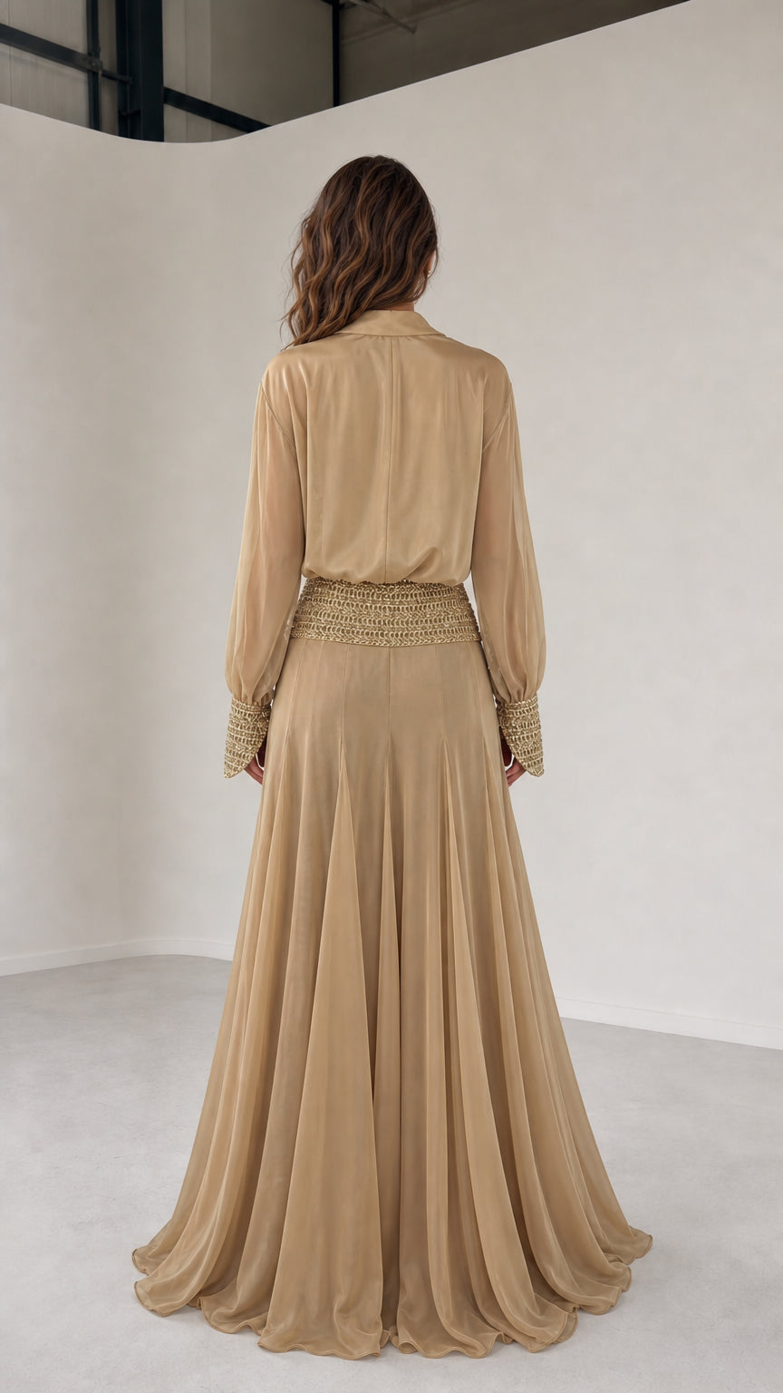 Back view of model wearing champagne three-piece chiffon set