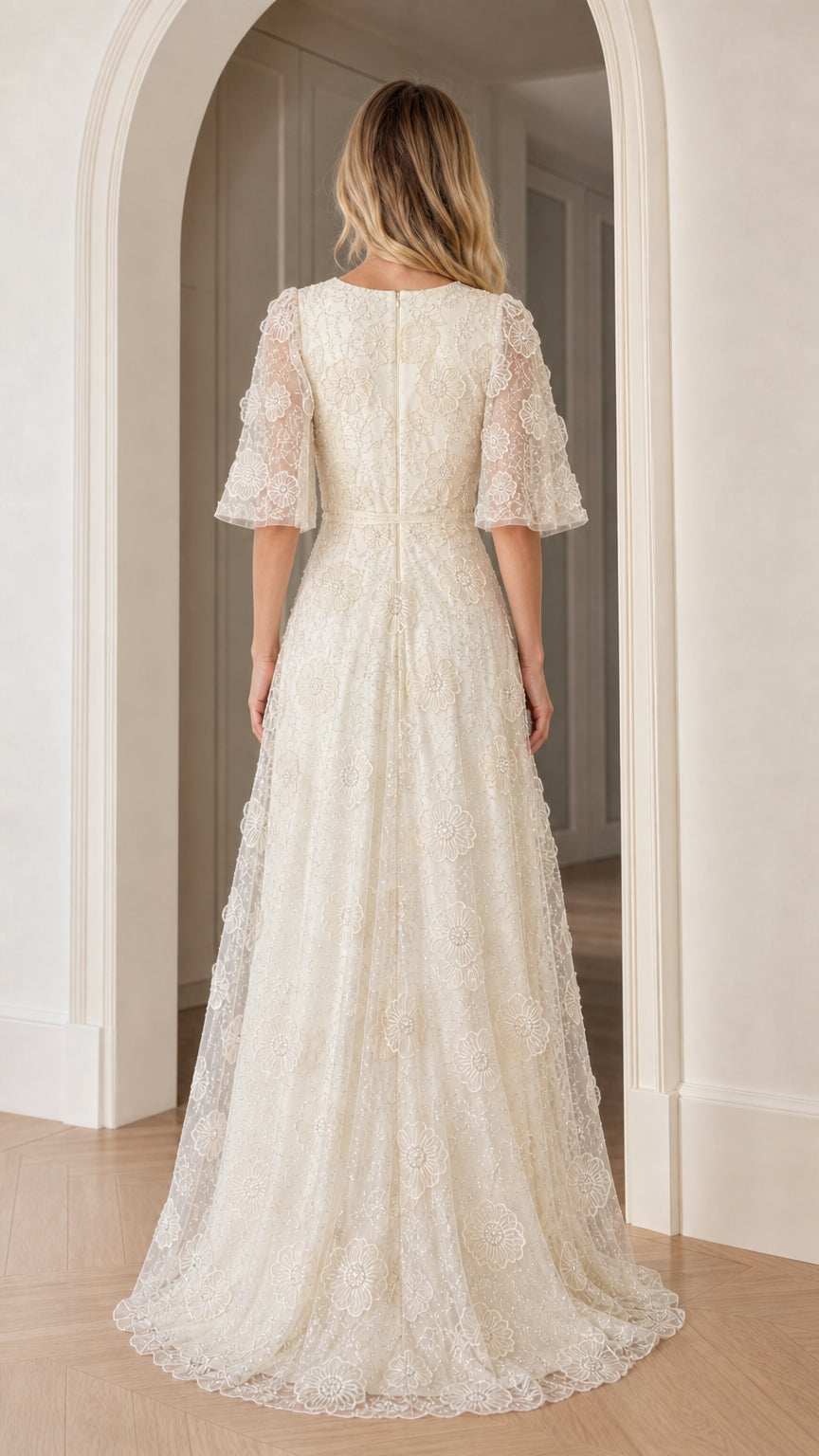 Back view of champagne maxi dress with flutter sleeves
