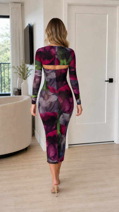 Back view showing cutout detail on the floral mesh midi dress