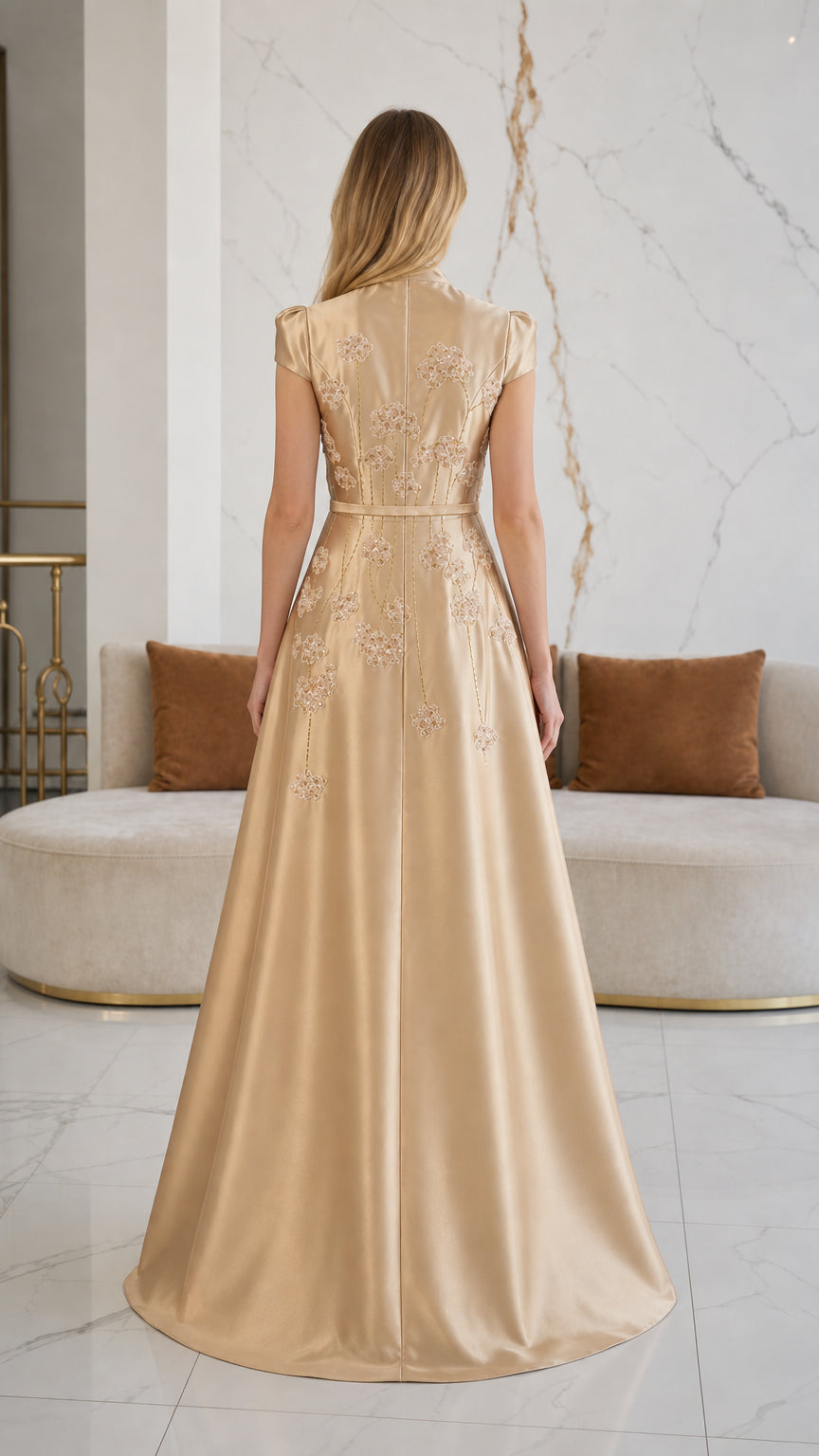 Back view of floor-length champagne gold satin formal dress
