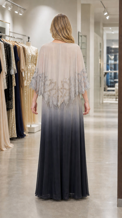 Back view of the black ombre evening gown showing the cape drape