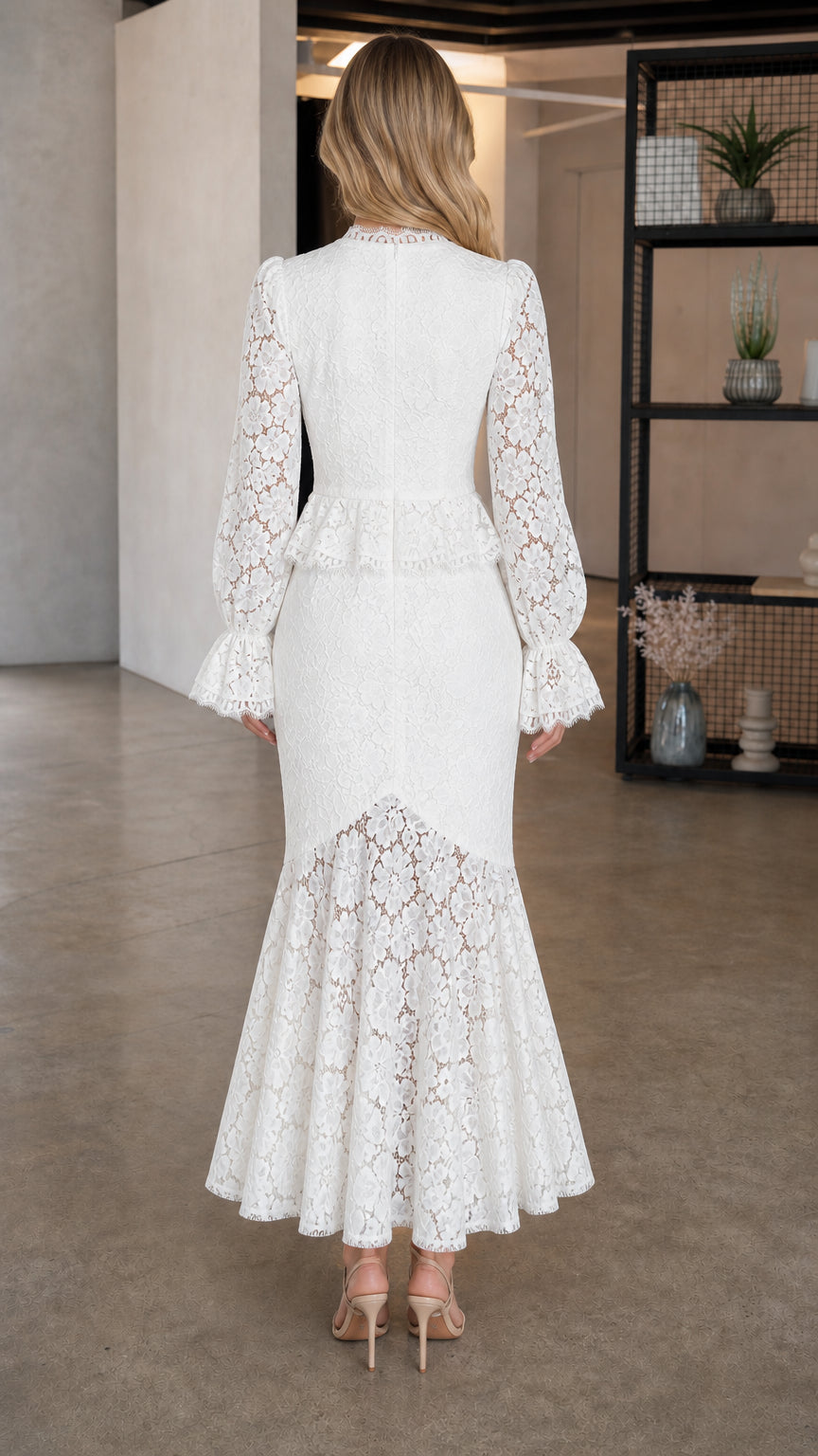 Back view of model showing detailed lace pattern and mermaid hem in white