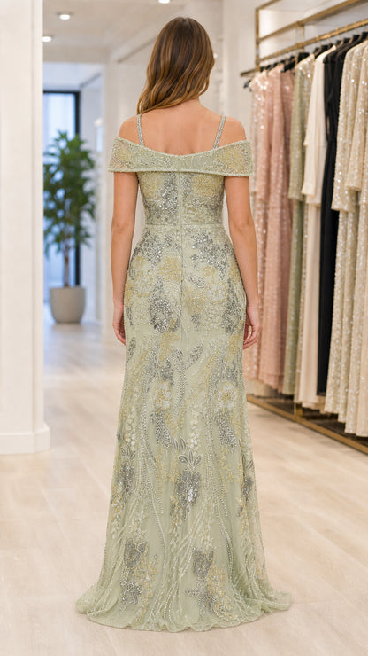 Sage green off-shoulder evening gown shown from the back with slim straps and flared hem