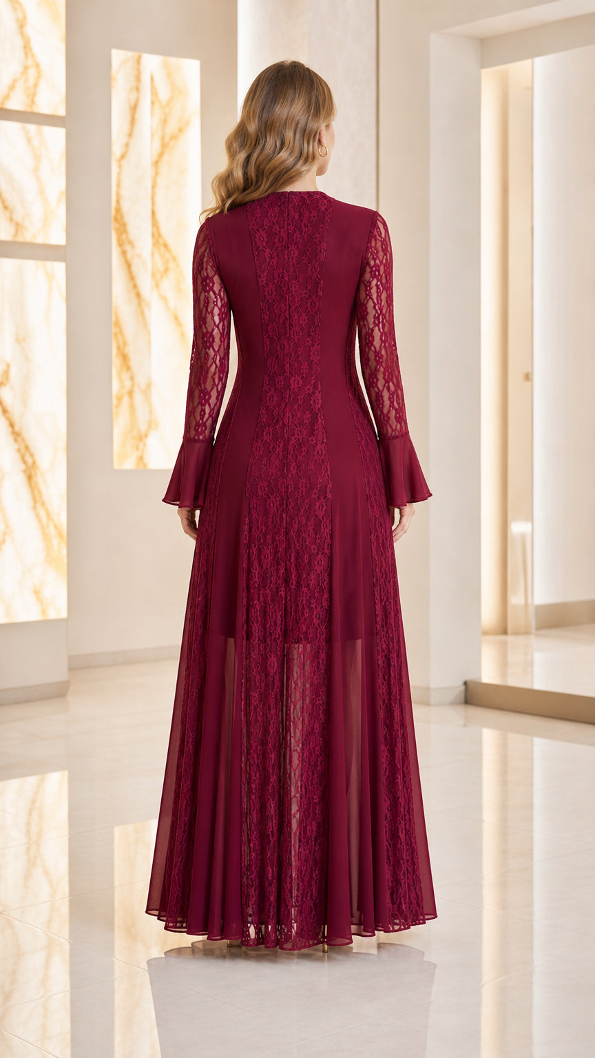 Back view of woman wearing burgundy maxi dress showing lace paneling and back zip