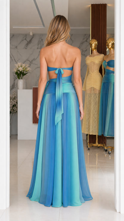 Model wearing blue ombre dress back view with tie closure